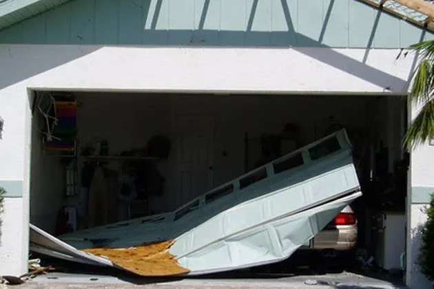 Garage door blown in by hurricane-force winds